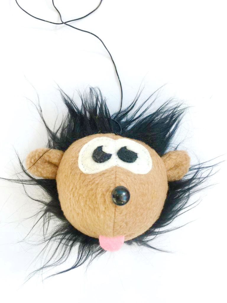 игрушка на резинке